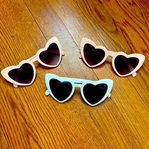 Three never used two pink heart sunglasses and one white
